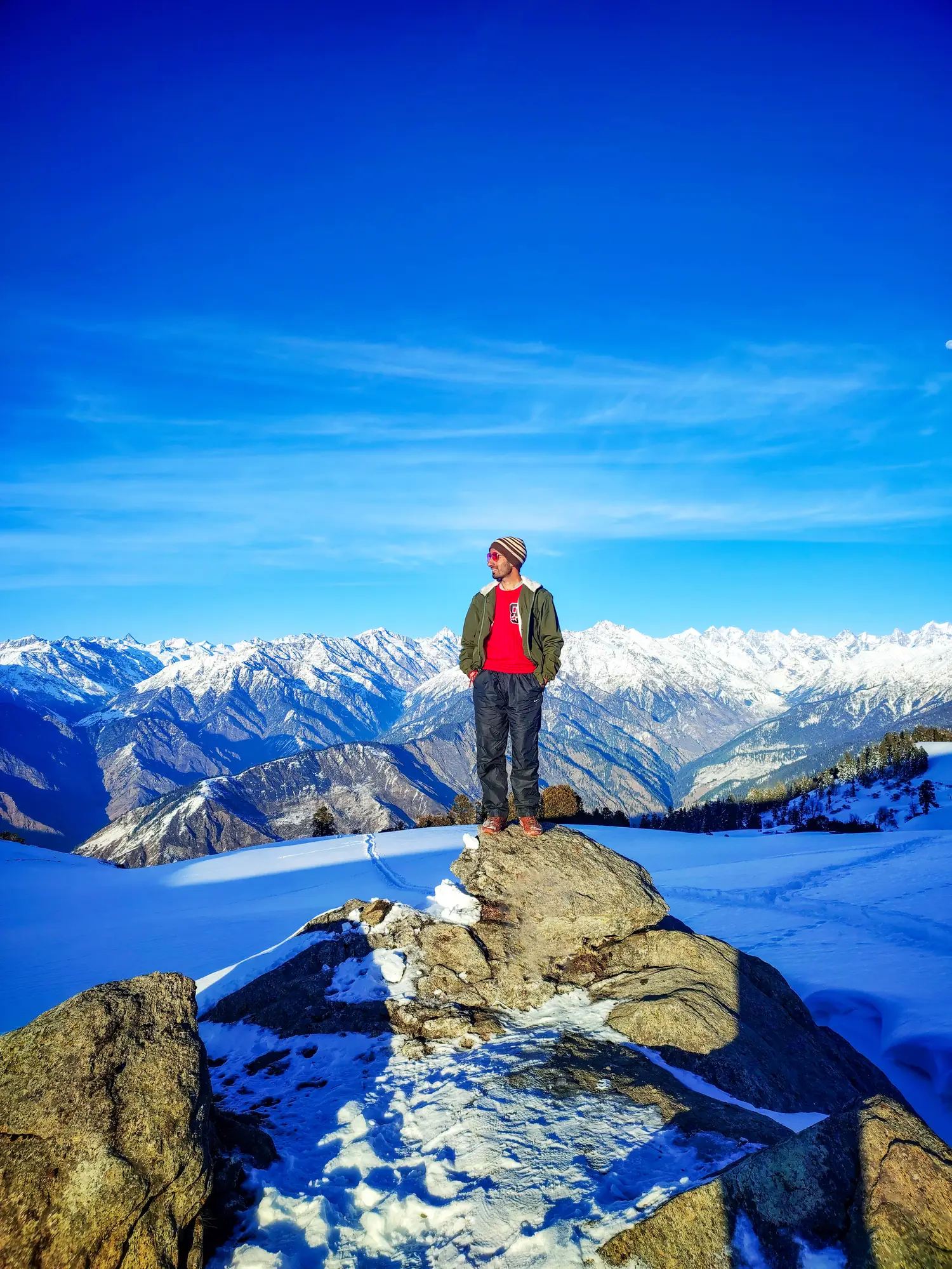 A wide frame capturing the full winter landscape