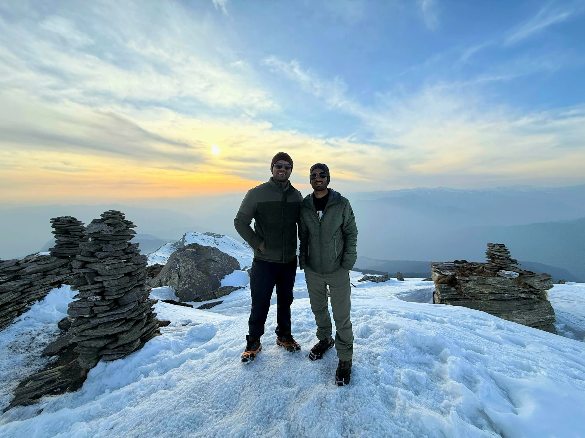 Group shot at the Kedarkantha summit marker